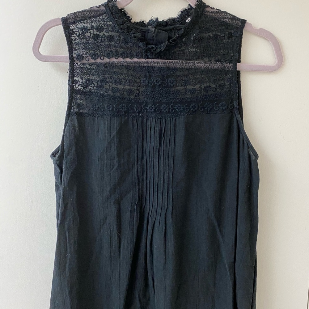 Sleeveless, lace black blouse